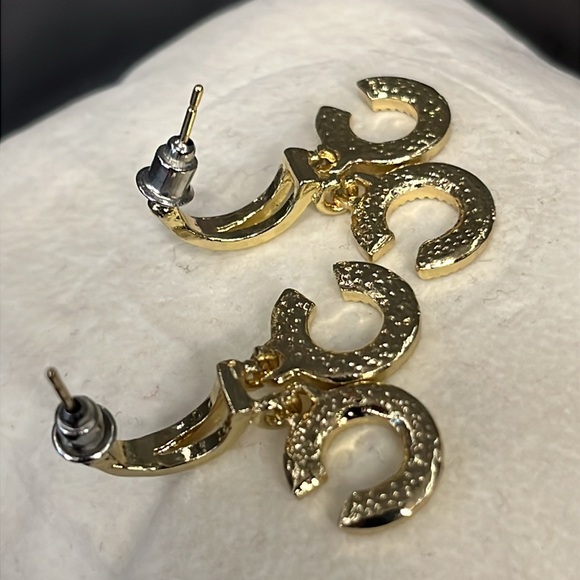 Gold tone “c” style dangly huggie earring. - Picture 2 of 3